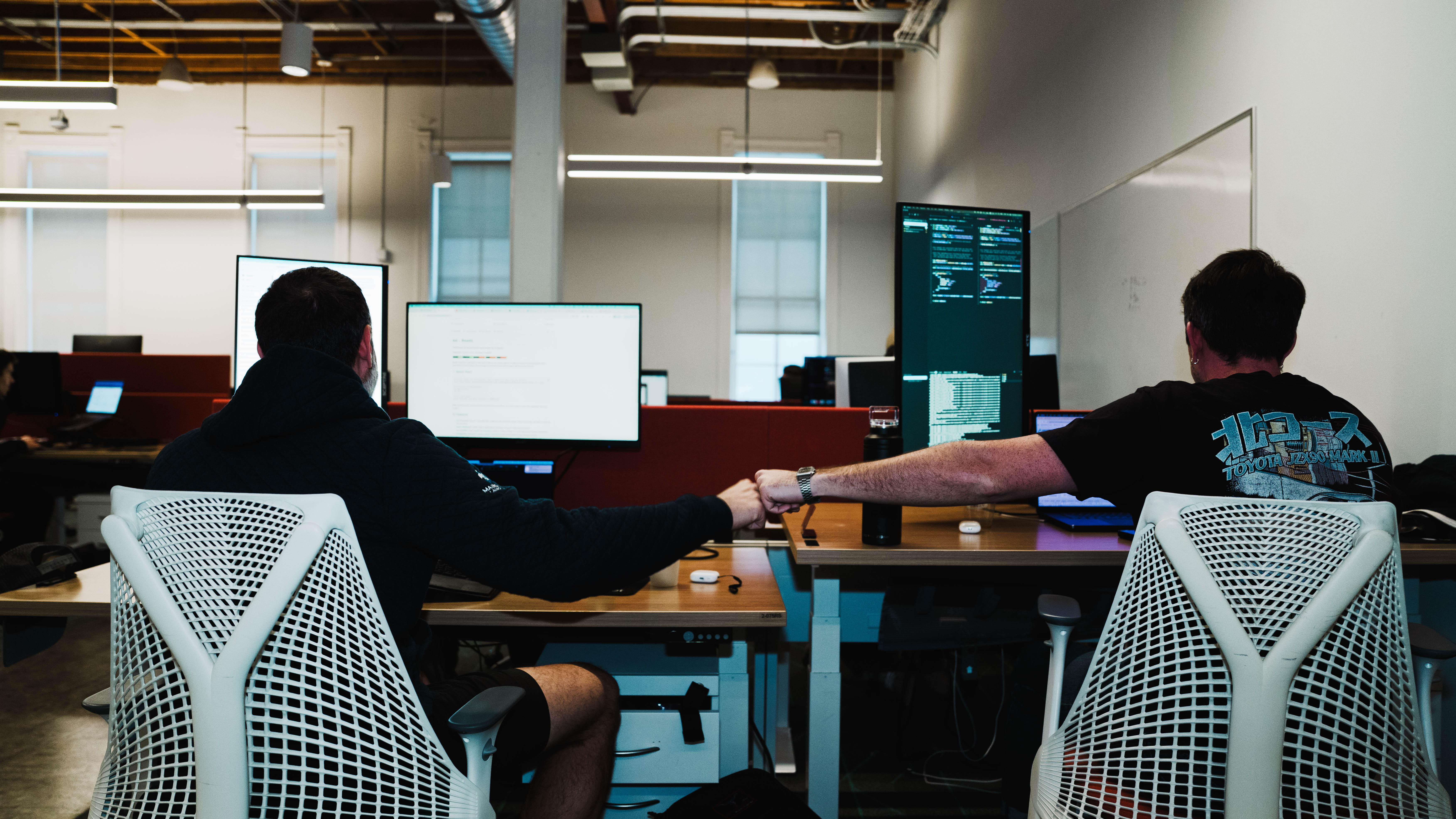 Gauntlet fellows working on laptops in the Austin space